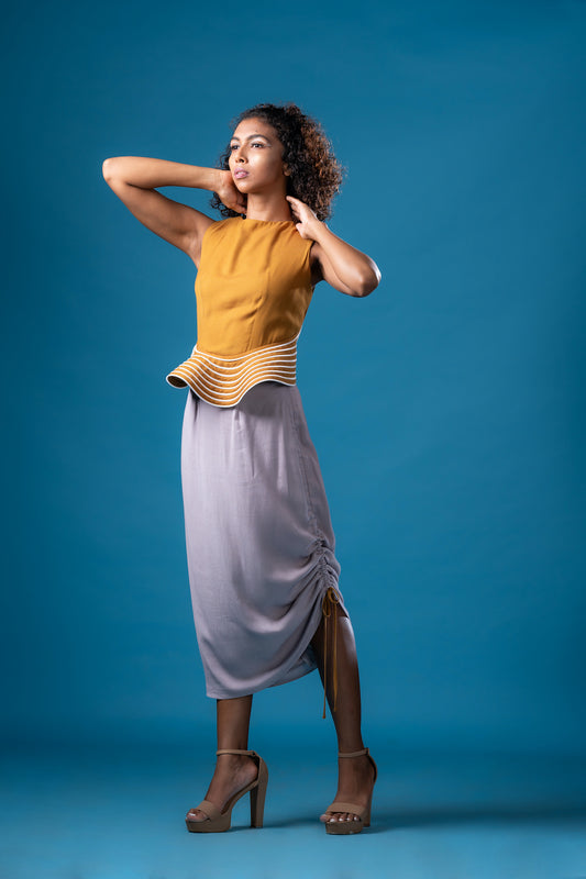 French Ochre Backless Peplum Top With Sepia Grey  Asymmetric Skirt - Khushboo Haran Borkar