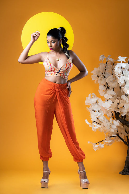 Cream Cross Wrap Top With Orange Front Cross Pleated Cuffed Pants - Khushboo Haran Borkar